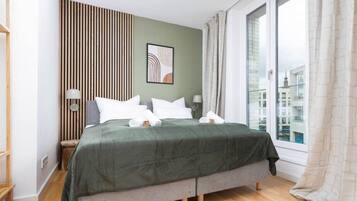 2 bedrooms, desk, iron/ironing board, travel crib