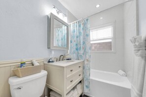 Shower, eco-friendly toiletries, towels, soap
