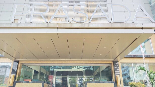 A modern building entrance with a sign reading "FRASADA". - Shankee Sudirman (Jakarta)