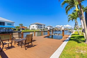 Enjoy waterfront views from the deck, which offers outdoor seating and overlooks a marina.