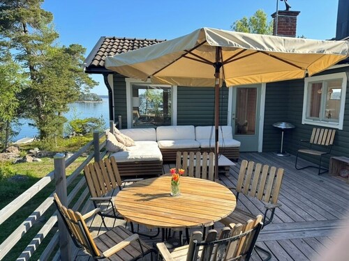 Your own peninsula with beaches, private docks, amazing sunset and motor boat