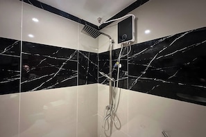 Quadruple Room | Bathroom | Shower, free toiletries, towels - White-Beach Hideaway Resort Puerto Galera (Puerto Galera)