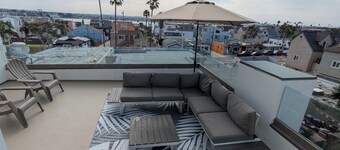 Steps from Ocean! Ocean/Bay Views! Rooftop Deck! Two Car Garage! Renovated!