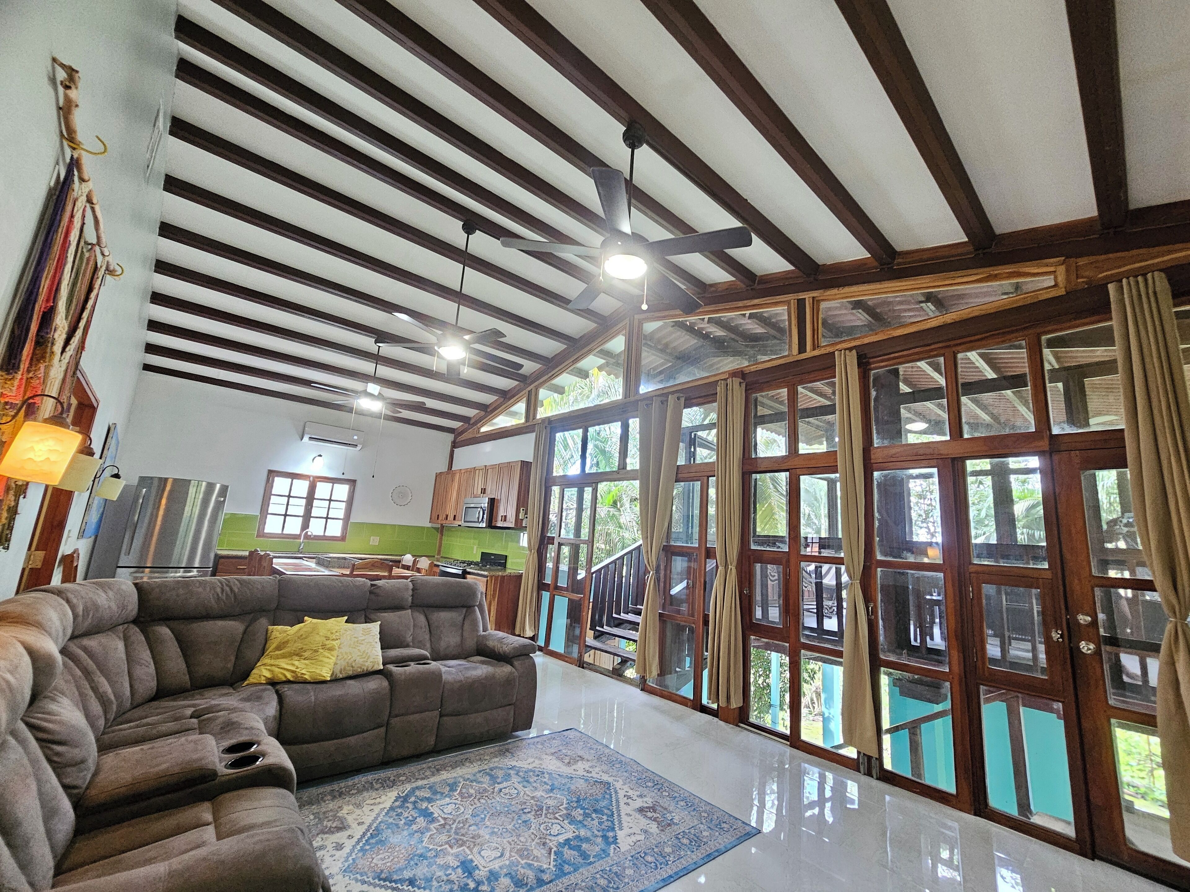 Large comfortable living room. TV, WIFI, A/C, fans, floor - ceiling window wall