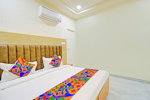 Habitación Deluxe | Sábanas de algodón egipcio y ropa de cama de alta calidad 