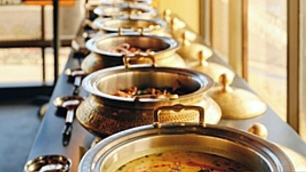A buffet line with multiple food containers. - FabHotel Le Royal Inn - Nr Madras Medical Mission Hospital (Chennai)