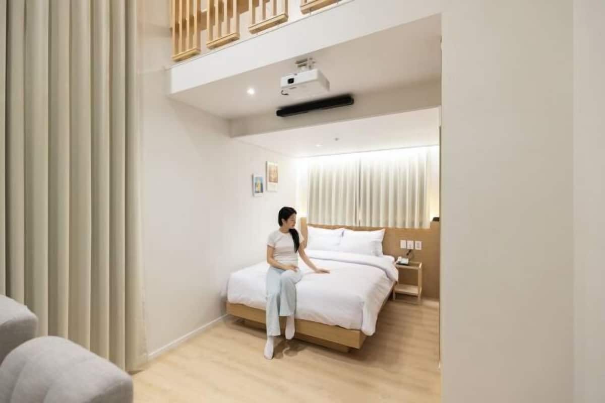 Premium bedding, blackout curtains, soundproofing, free WiFi
