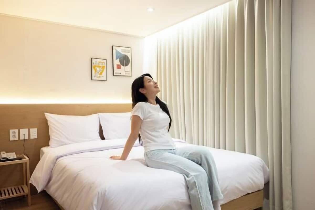 Premium bedding, blackout curtains, soundproofing, free WiFi