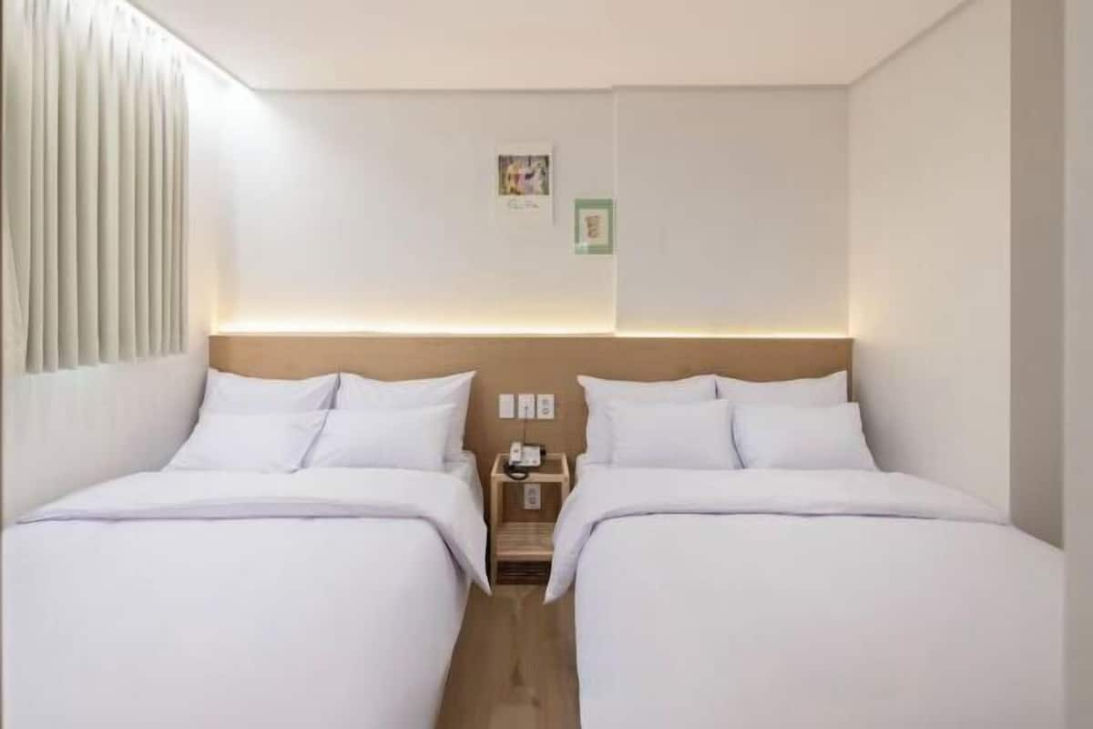 Premium bedding, blackout curtains, soundproofing, free WiFi