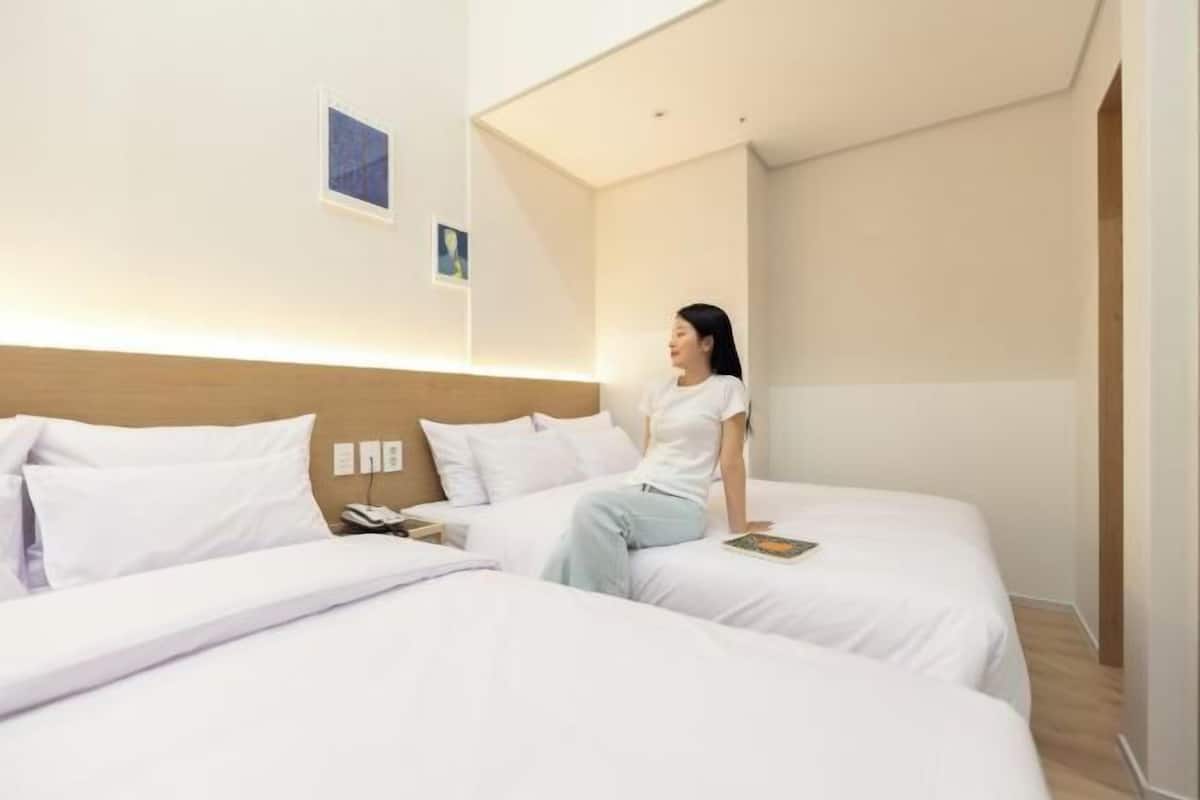 Premium bedding, blackout curtains, soundproofing, free WiFi