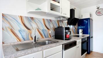 Fridge, microwave, dishwasher, coffee/tea maker