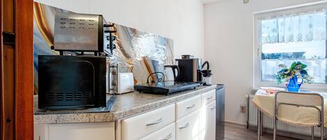 Fridge, microwave, dishwasher, coffee/tea maker