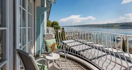 Chambre 'Mit Seeblick Und Balkon' avec vue sur lac, terrasse partagée et Wi-Fi