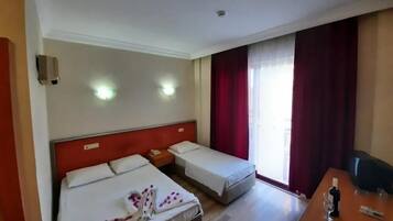 Standard Double or Twin Room, Pool View | In-room safe, desk, laptop workspace, free WiFi