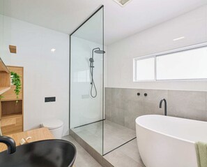 Shower, hair dryer, towels, soap