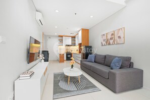 Apartment, 3 Bedrooms, City View | Living area | Flat-screen TV