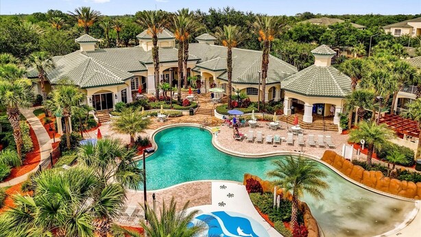 A resort with a large pool, palm trees, and a gazebo. - Book your Labor Day stay before dates fill up / Plus Free Night! (Kissimmee)