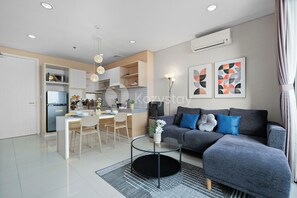 Apartment, 2 Bedrooms, City View | Living area | Flat-screen TV