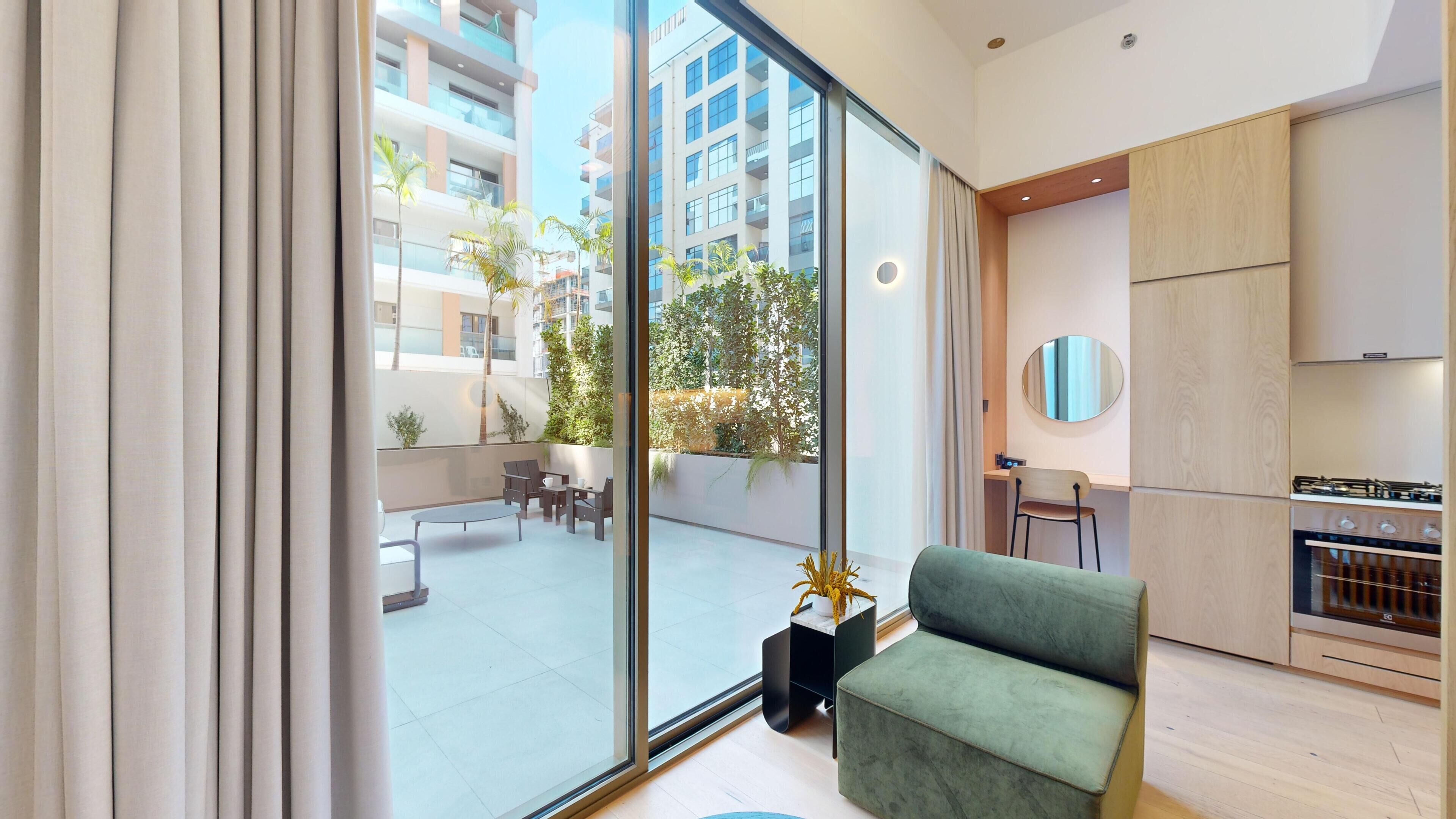 Deluxe Studio, 1 Queen Bed, Terrace, City View | Individually decorated, individually furnished, desk, free WiFi