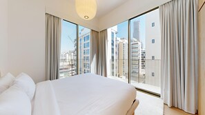 Apartment, 2 Bedrooms, Balcony, City View | 1 bedroom, individually decorated, individually furnished, desk