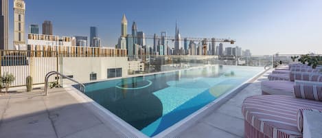 Outdoor pool, pool umbrellas, pool loungers
