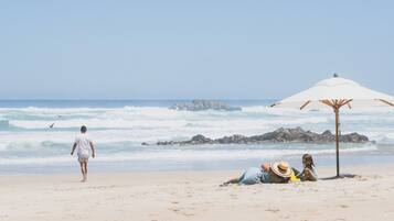 On the beach, beach umbrellas, beach towels
