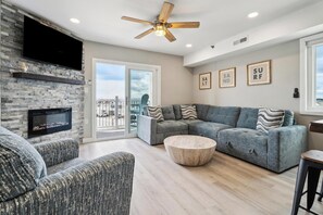 TV, fireplace, books, offices