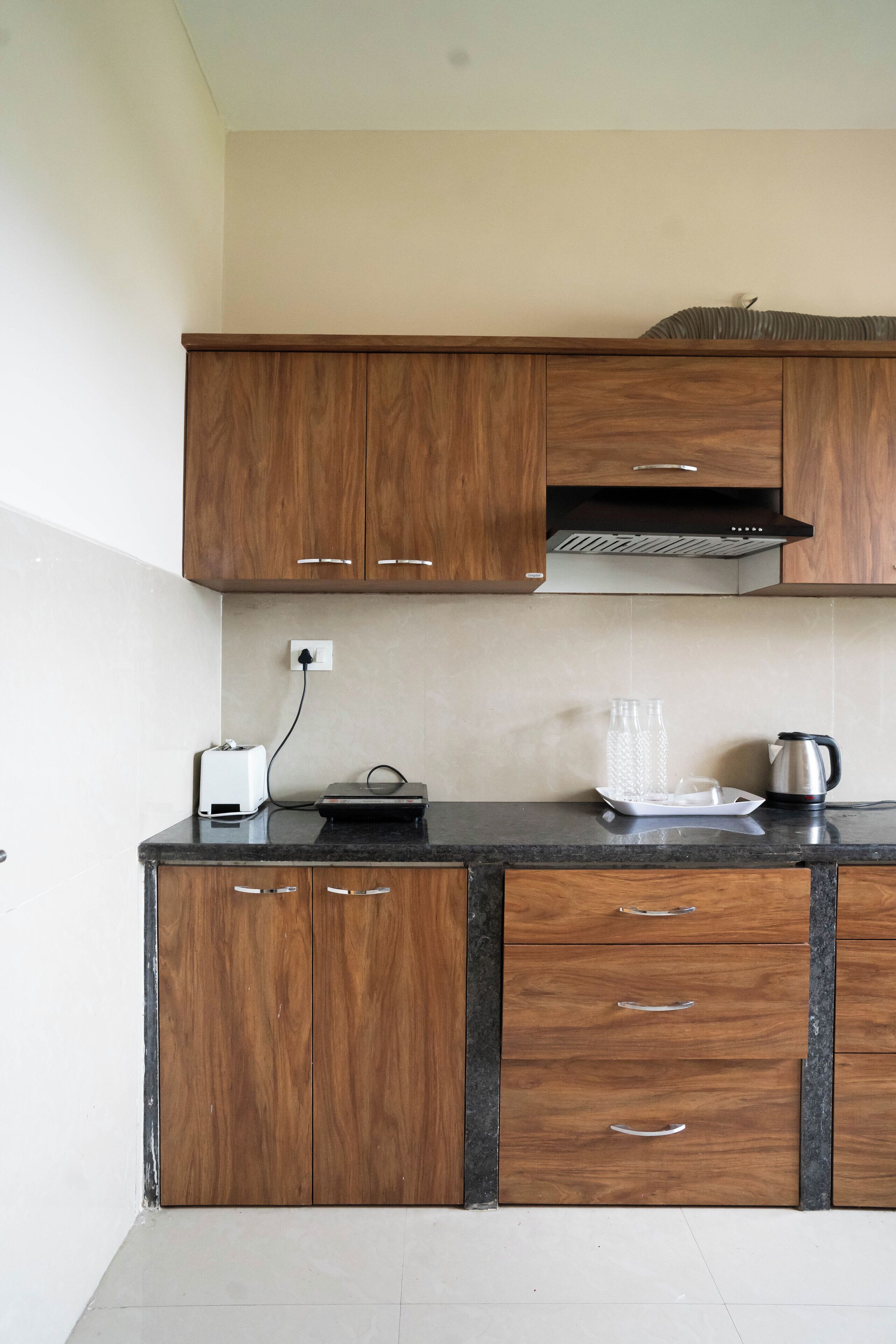 Fridge, microwave, electric kettle, cookware/dishes/utensils