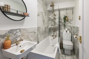 Hair dryer, towels, soap, shampoo