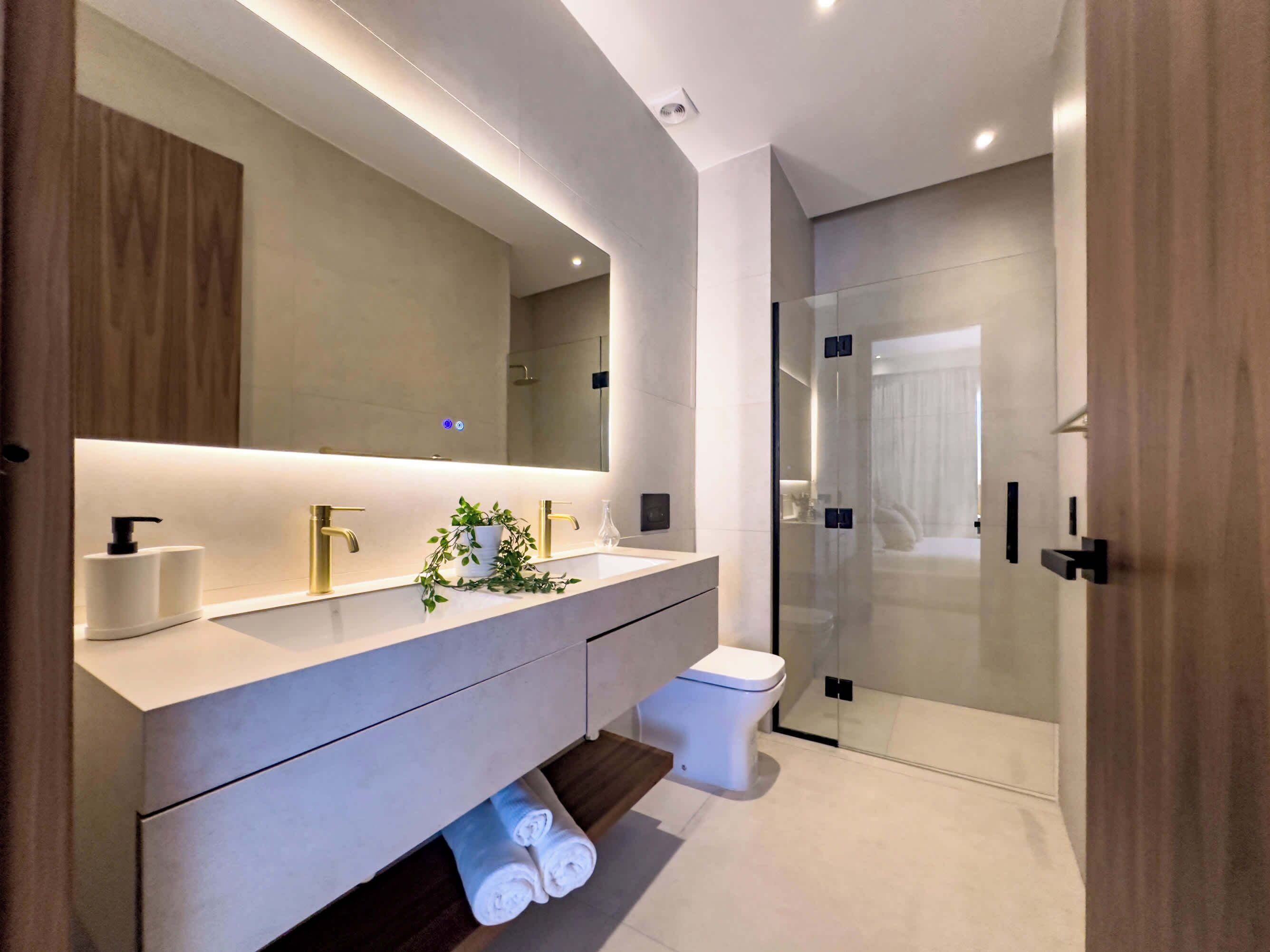 Shower, hair dryer, towels, shampoo
