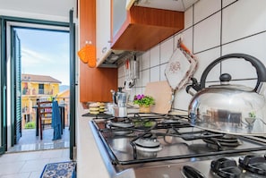 Standard Apartment, 2 Bedrooms (Casa Nancy) | Private kitchen | Fridge, oven, stovetop, coffee/tea maker
