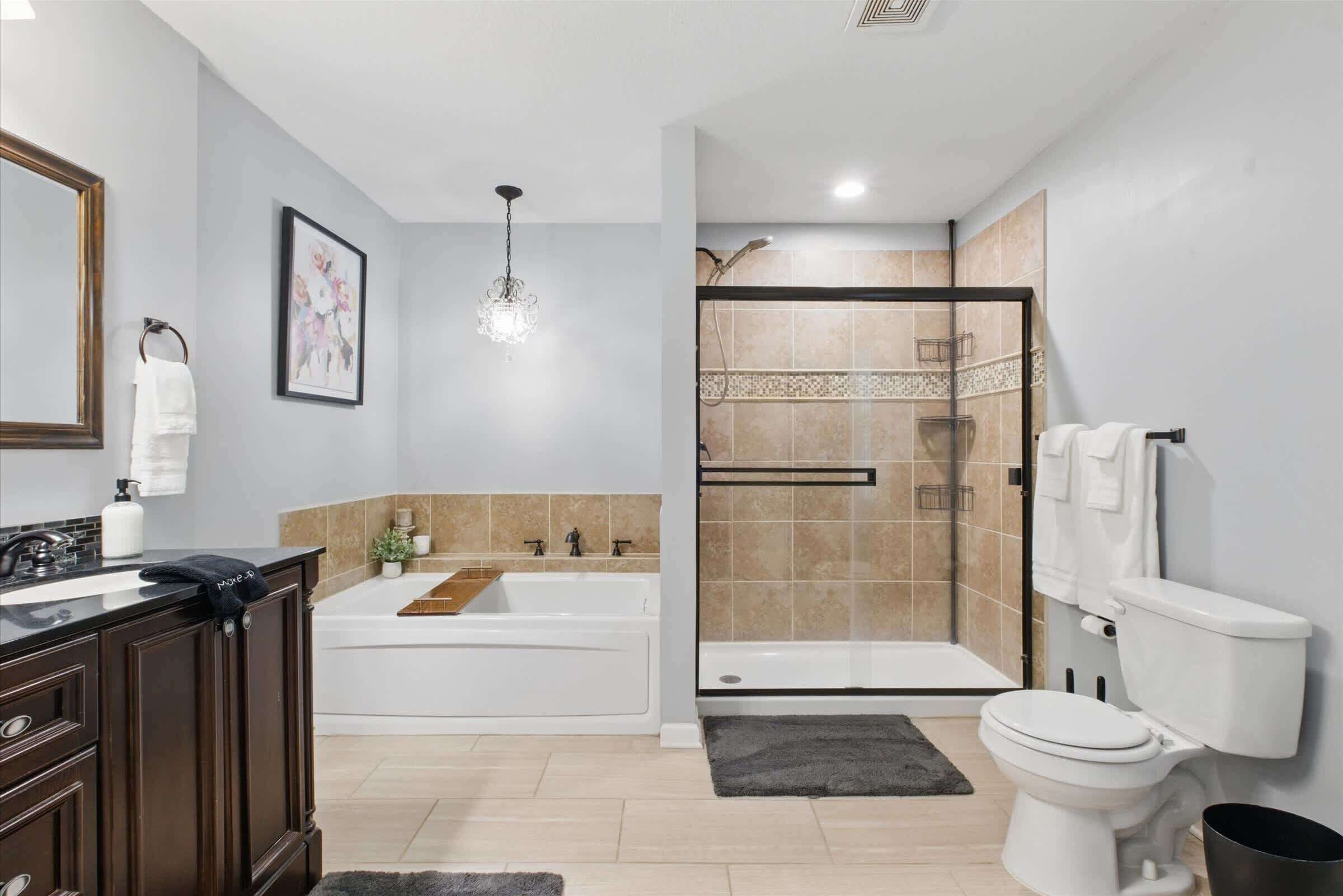 Shower, hair dryer, towels, shampoo