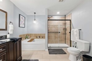 Shower, hair dryer, towels, shampoo