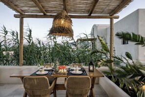 Outdoor dining - ensō - eco-friendly designed luxury villa with pool near sea (Ag. Paraskevi)