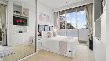 Apartment, 1 Bedroom, City View | Laptop workspace, iron/ironing board, free WiFi