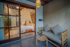 Villa, 1 Bedroom, Pool View | Living area | Flat-screen TV