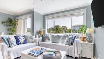 Smart TV, fireplace, books, offices