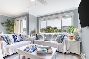 Smart TV, fireplace, books, offices