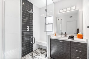 Shower, hair dryer, towels