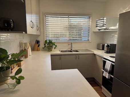 Fridge, microwave, oven, stovetop. Kath's Cottage - Your Haven Away From Home