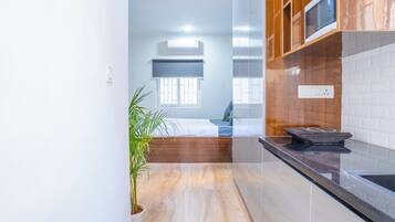 Studio, City View | Private kitchenette | Fridge, microwave, oven, dishwasher