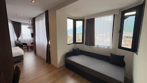 Deluxe Triple Room, Mountain View | Soundproofing, free WiFi