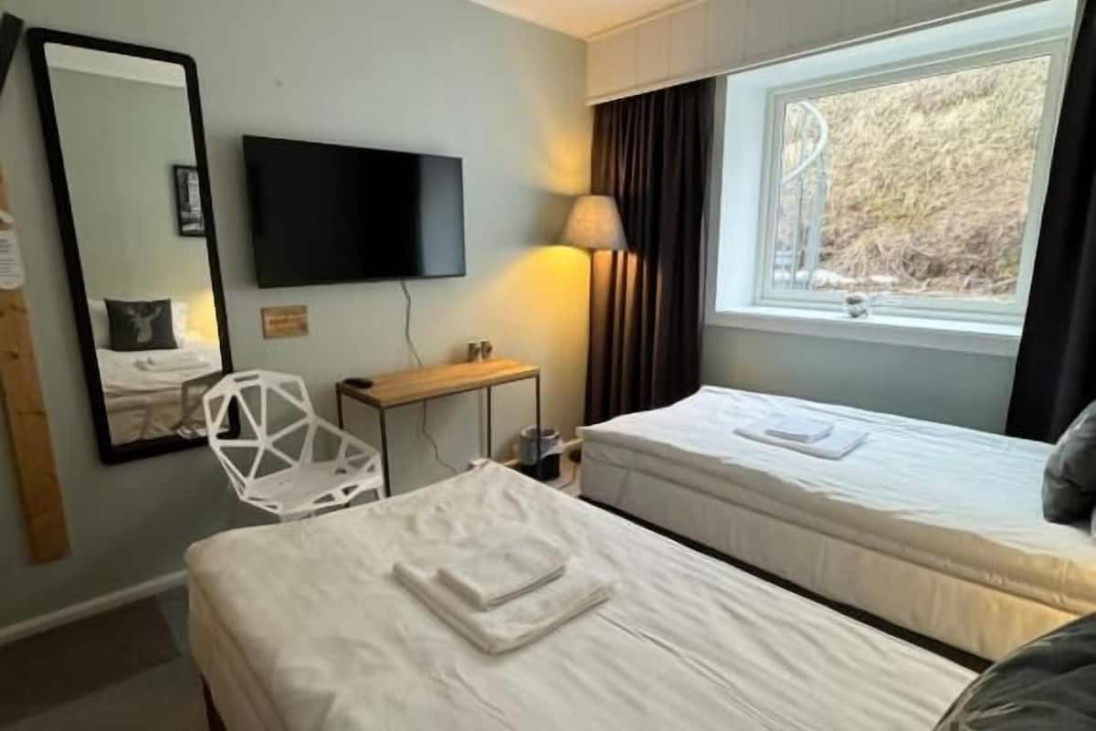 Chambre Confort Double ou avec lits jumeaux, vue ville | Wi-Fi gratuit
