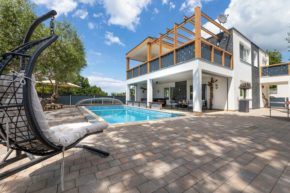 Outdoor pool, a heated pool - Vacation home with pool and sea view (Unknown)
