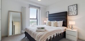 1 bedroom, desk, iron/ironing board, travel cot