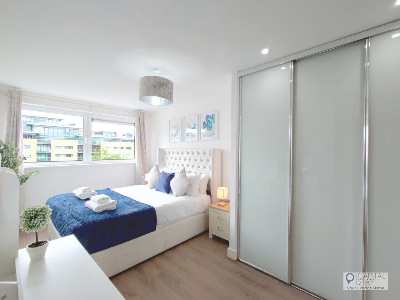 2 bedrooms, desk, iron/ironing board, travel crib