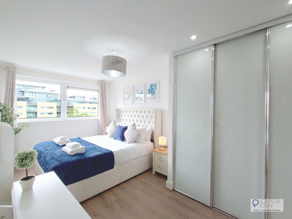 2 bedrooms, desk, iron/ironing board, travel crib