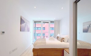 1 bedroom, desk, iron/ironing board, travel cot