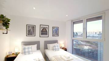 2 bedrooms, desk, iron/ironing board, travel crib