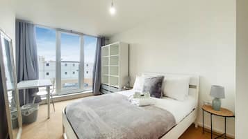 1 bedroom, desk, iron/ironing board, travel cot